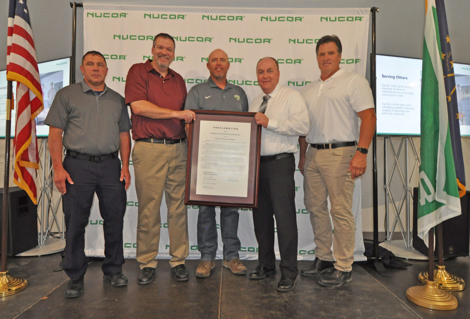 Friday was Nucor Steel Day in Crawfordsville and Montgomery County as declared Crawfordsville Mayor Todd Barton and Montgomery County Commissioners in a joint proclamation. The proclamation was presented during a 30th anniversary event celebrating three decades of Nucor Steel in Crawfordsville. Pictured from left is Montgomery County Commissioners President Jim Fulwider, Vice President and General Manager of Nucor Steel Indiana Dan Needham, County Commissioner Dan Guard, Barton and County Commissioner John Frey.
