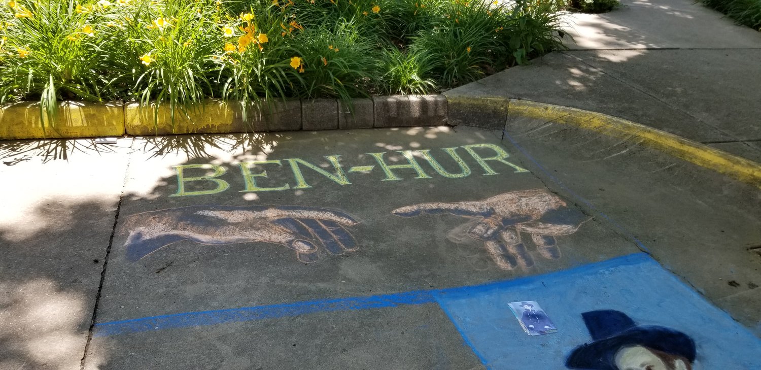 Artists and board members from Athens Arts Gallery visited the General Lew Wallace Study & Museum this week and created Lew Wallace-related chalk art to celebrate the museum’s reopening to the public.