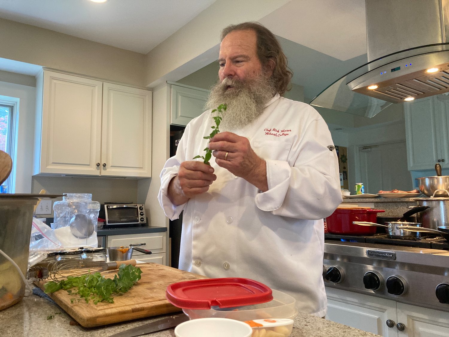 Richard Warner conducts a virtual cooking class from his kitchen.