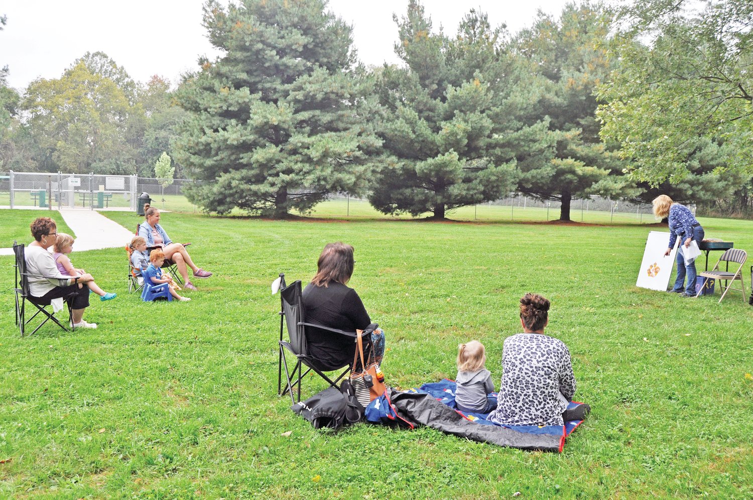 Children’s librarian assistant Janella Nunan leads an activity Wednesday at the Crawfordsville District Public Library’s Story Time on the Sugar Creek Trail.