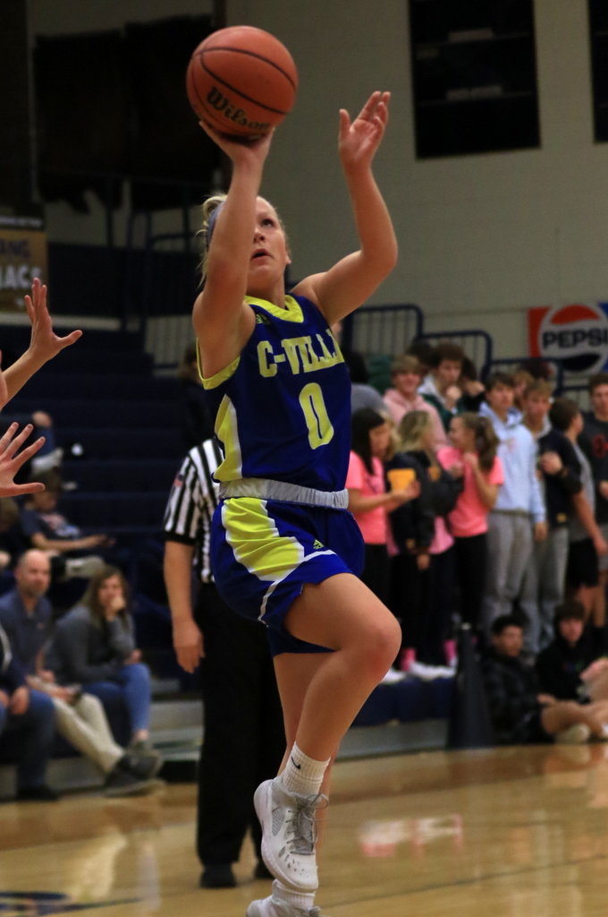 Olivia Reed runs in for a floater. The senior ended the game with nine points.