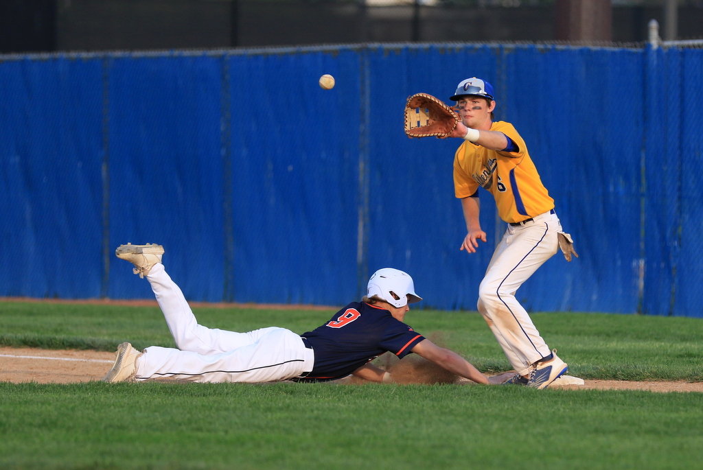 Gage Galloway slides back into first after a pick off attempt from Crawfordsville