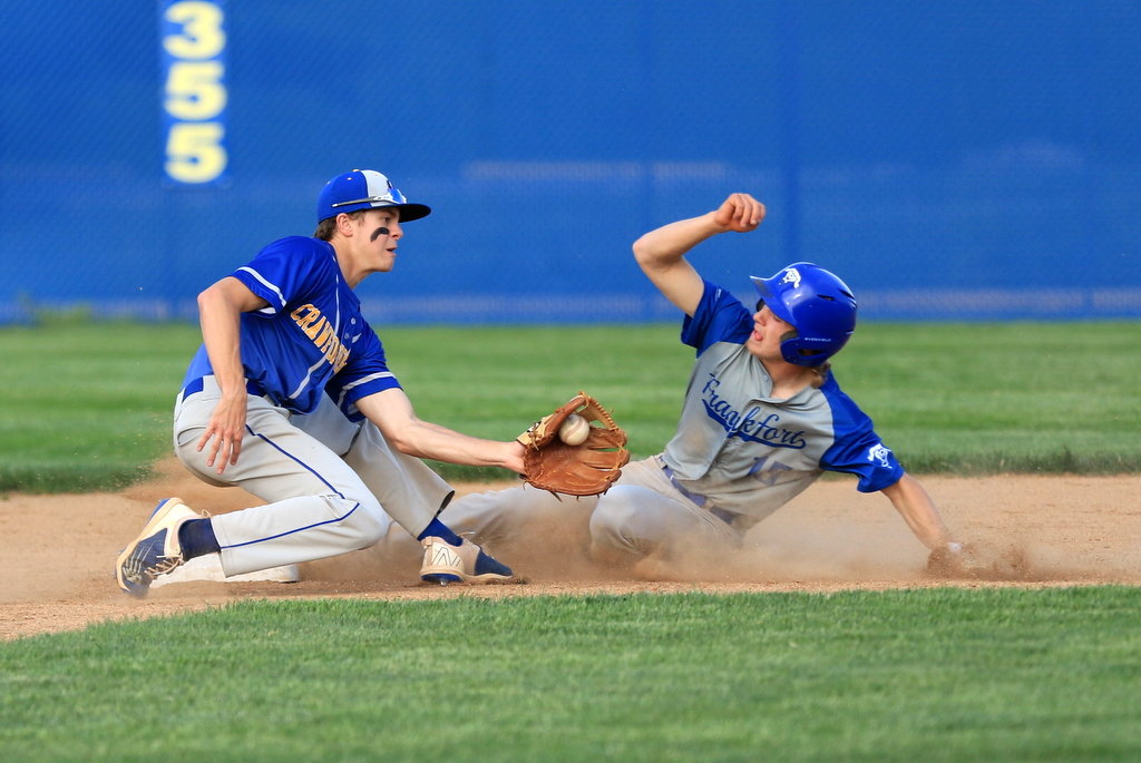 Jude Coursey makes a tag at 2nd base for the Athenians.