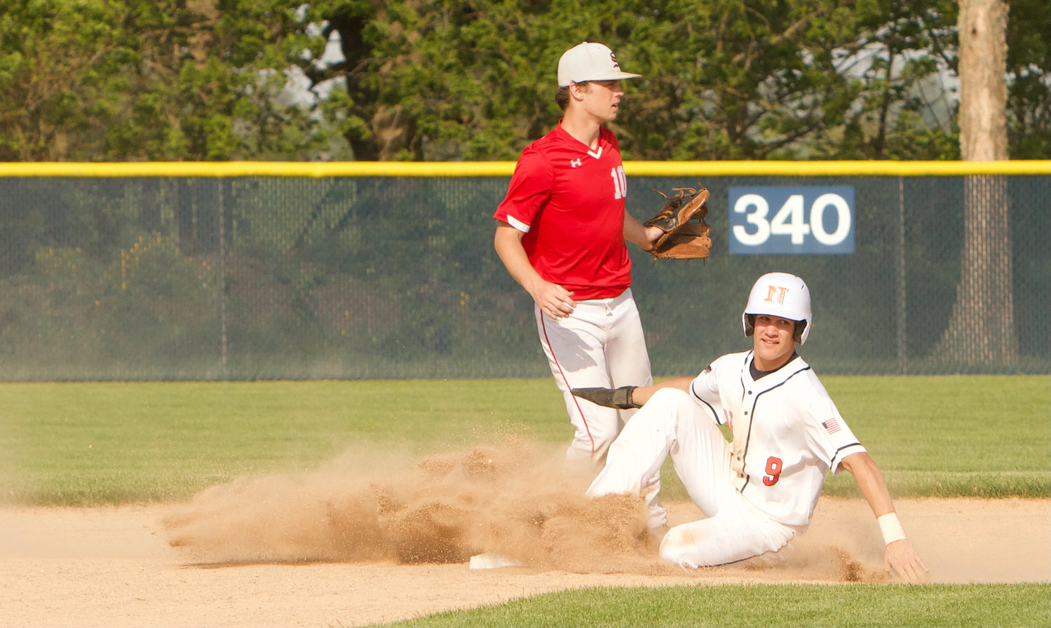 Gage Galloway slides into second base.