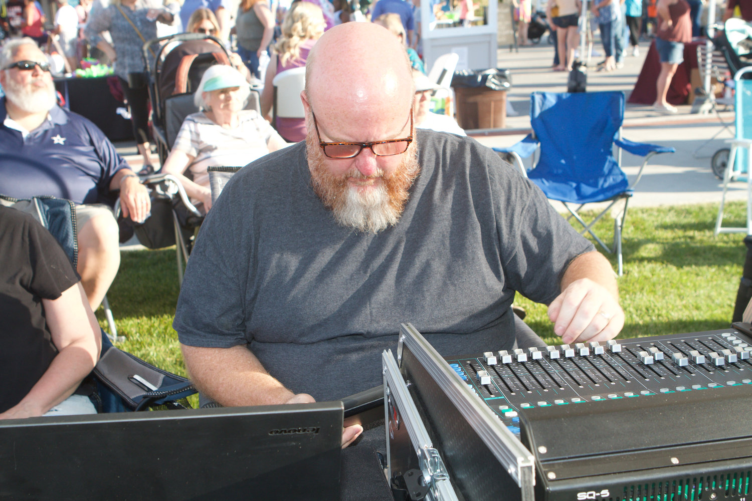 Matt Cunningham works the soundboard.