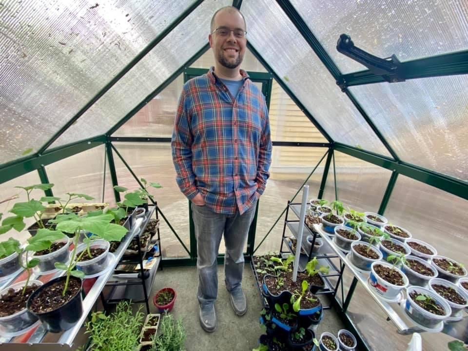 Nate Tompkins gets things growing in his greenhouse on West Main Street. He and his wife, Jackie McDermott, are excited to connect with other local growers as part of a free Garden Walk on Saturday sponsored by the Community Growers of Montgomery County.